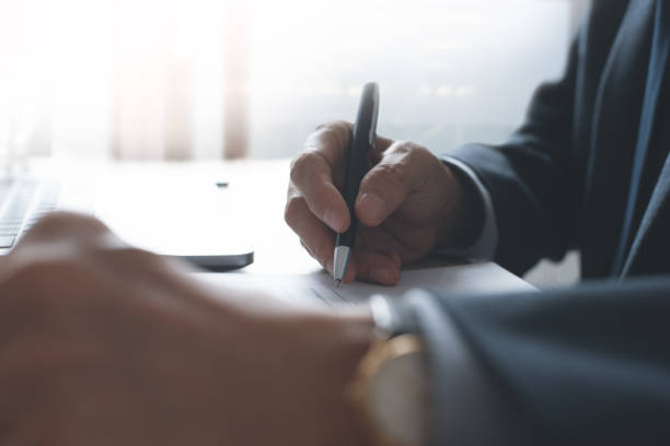 istock Businessman signing contract 1335991073