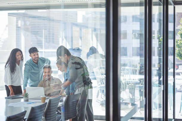 istock Diverse group of business people working. 1335991712