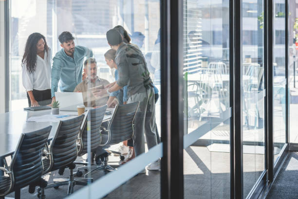 istock Diverse group of business people working. 1335991713