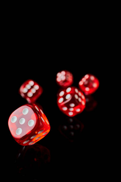 istock red and white craps or dices on reflective black background 1335994232
