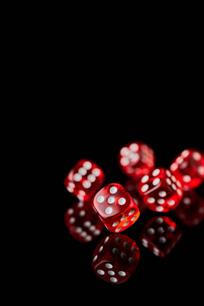 istock red and white craps or dices on reflective black background 1335994233