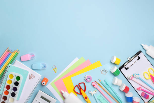 istock Flat lay office supplies. Various stationery on a light blue background 1335995691