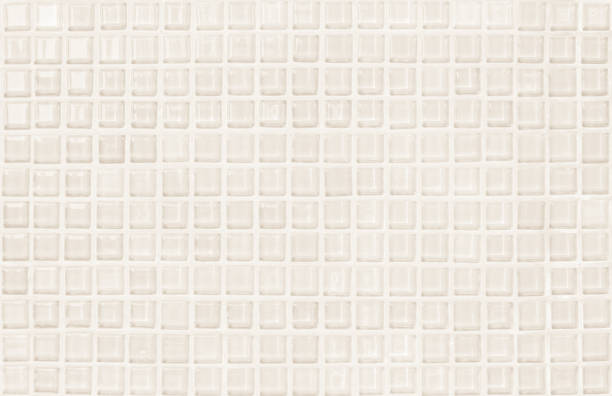 istock Cream pastel ceramic wall and floor tiles abstract background. Design geometric mosaic texture decoration of the bedroom. Simple seamless pattern for backdrop advertising banner poster or web. 1336005676