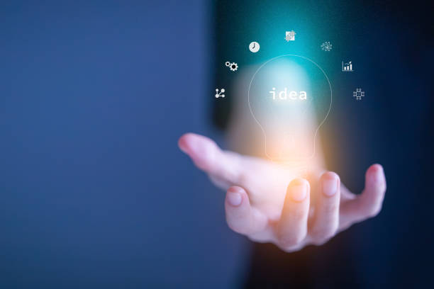 istock Hand holding illuminated light bulb, idea and imagination, business, creative, innovation inspiration concept. 1336009567