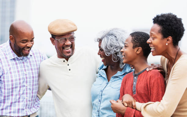 istock Multi-generation African-American family laughing 1336010427