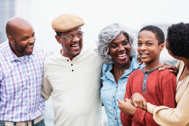 istock Multi-generation African-American family, looking at boy 1336010432