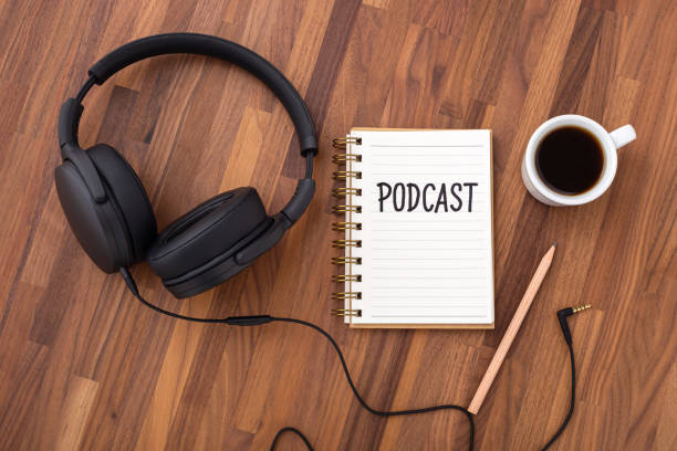 istock Podcast concept with headphones and coffee cup 1336016638