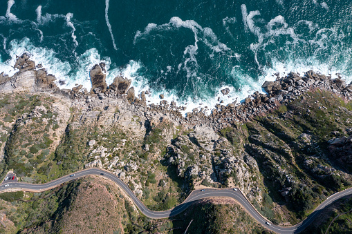 Aerial view over Chapman's Peak drive looking over the ocean near Cape Town.