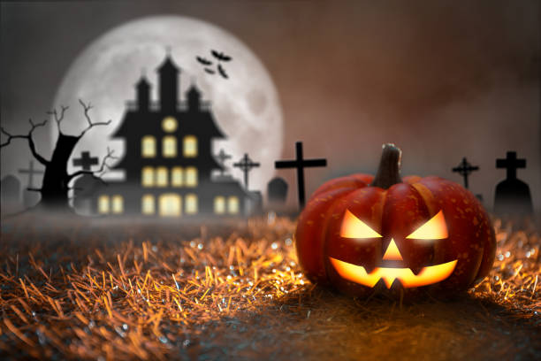 istock Spooky Halloween Pumpkin in graveyard. Halloween Party and Celebration. 1336021798