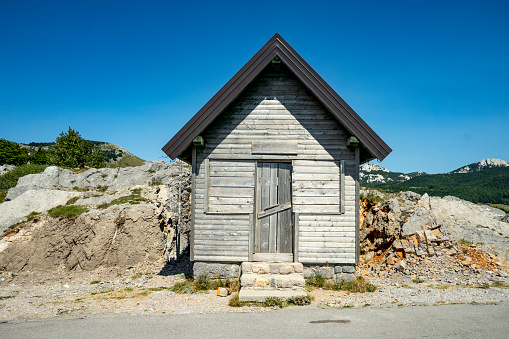 wooden house in the mountainous part of croatia, at an altitude above 1500 meters, sunny, summer