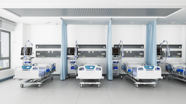 istock Intensive Care Unit In The Hospital With Front View Of Empty Beds. 1336028194