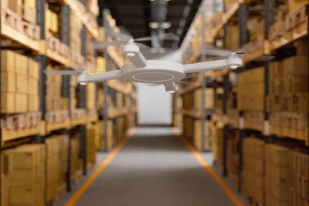 Remote Controlled Drone Flying In The Warehouse. Cardboard Boxes On The Racks.