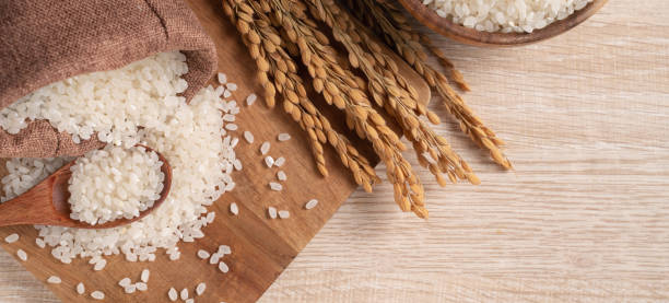 istock White rice in a bowl on wooden table background. 1336034522