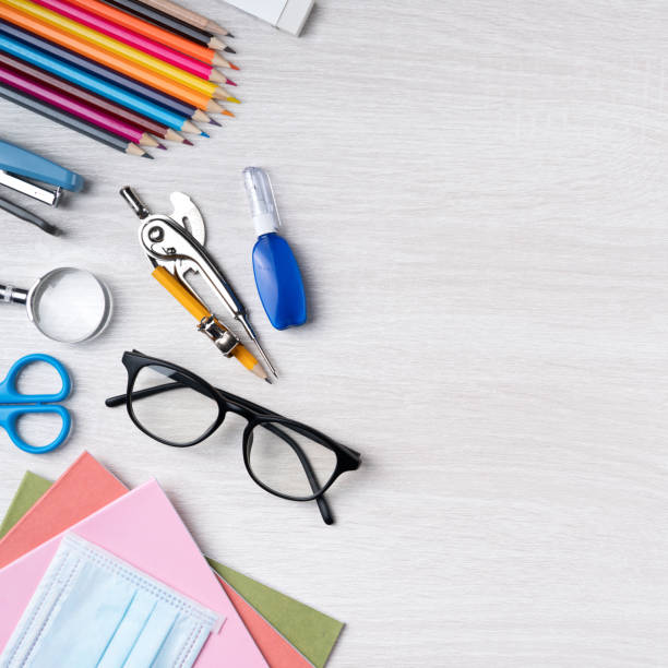 istock Back to school design concept with stationery over wooden table background. 1336034677