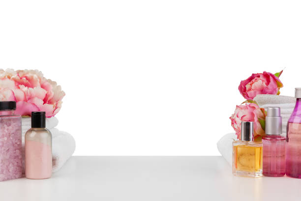 istock Spa composition with towels and flowers isolated on white 1336037381