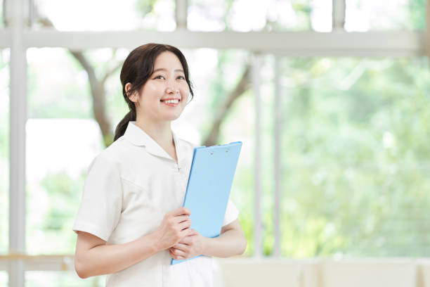 istock Female nurse working in a hospital 1336037500