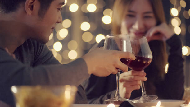 istock Young couple celebratory toast 1336039278