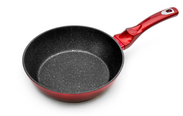 istock Red frying pan with non-stick coating on white. 1336049502