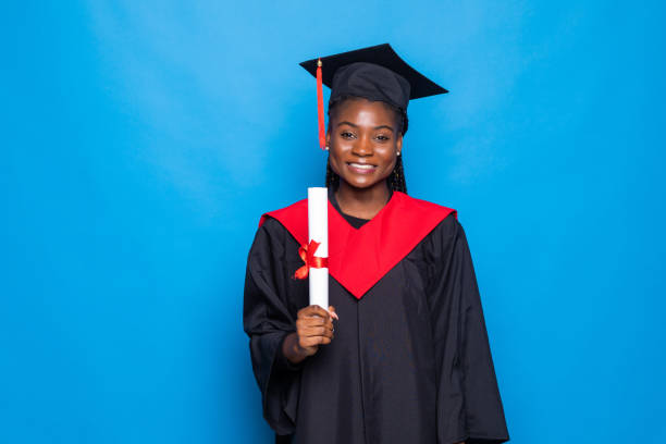 istock African woman in a robe and hat, on a white isolated background 1336054044