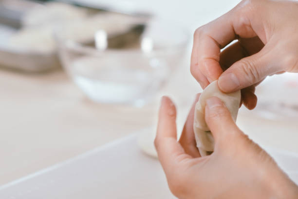 istock Wrapping gyoza , Japan 1336055150