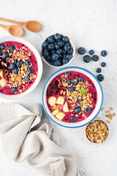 istock Purple smoothie bowl with toppings 1336055872