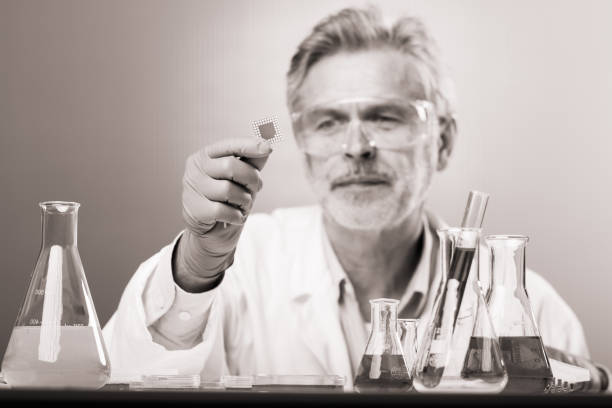 Close up of a senior scientist working in laboratory.