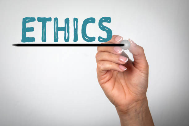 Ethics, business concept. Woman's hand with a pen writes on the screen