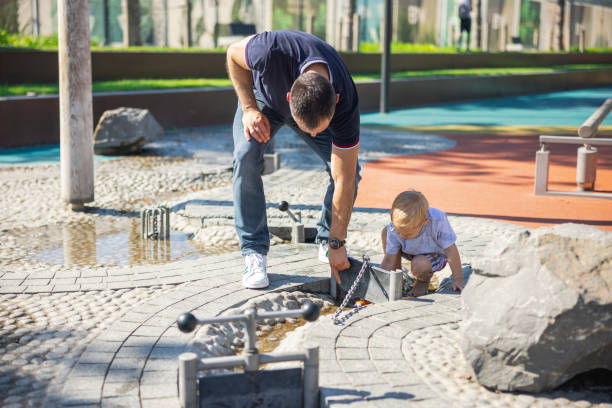 istock Father showing his son how to solve the problem with the obstacle 1336059564