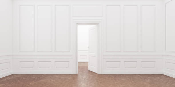 istock 3d rendering of the open white door in the empty classic room. 1336059567