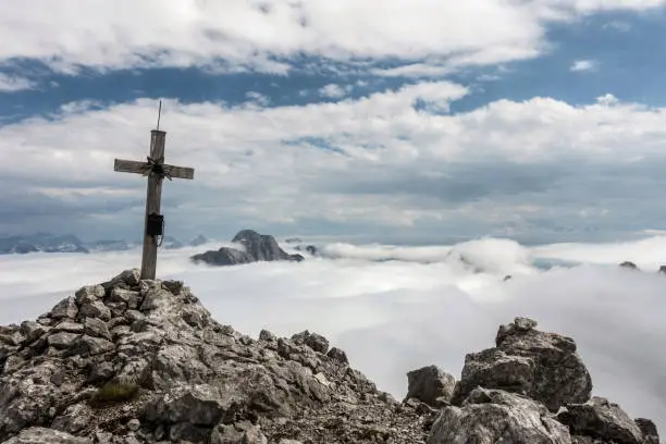 Summit cross in the Berchtesgaden Alps (Steintalhörnl), Berchtesgaden, Bavaria, Germany.