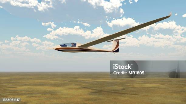 Glider Over A Landscape Stock Photo - Download Image Now - Gliding, Glider, Cloud - Sky