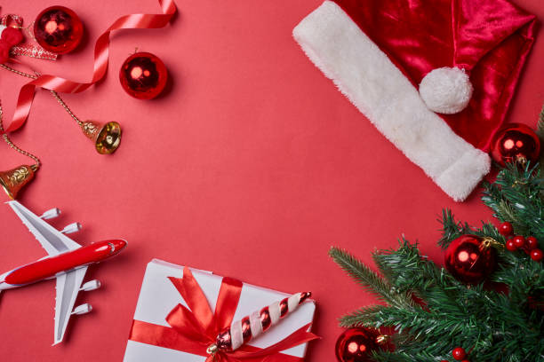 istock Christmas background with decorations and airplane 1336063222