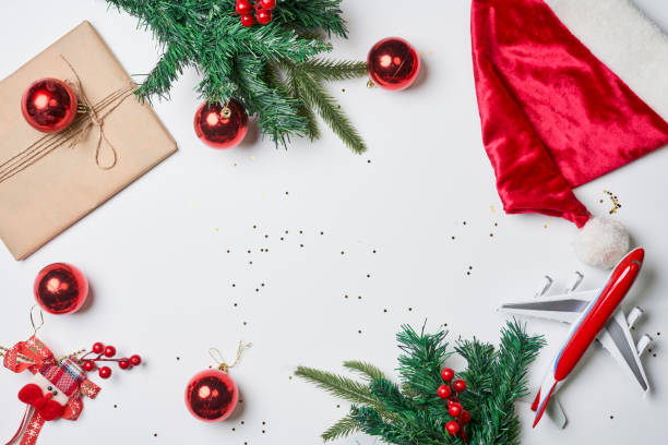 istock Christmas background with decorations and airplane 1336063306
