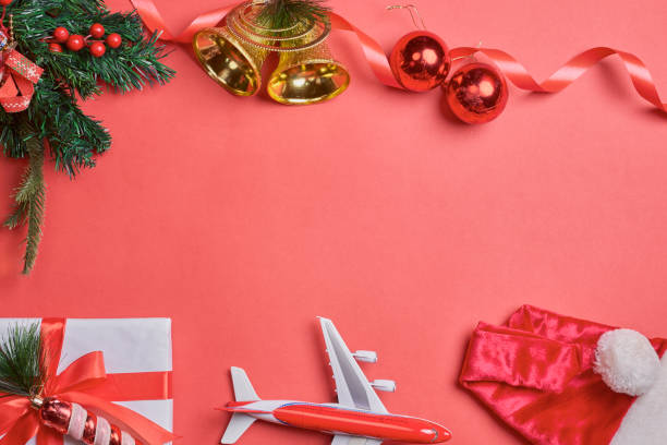 istock Christmas background with decorations and airplane 1336063503
