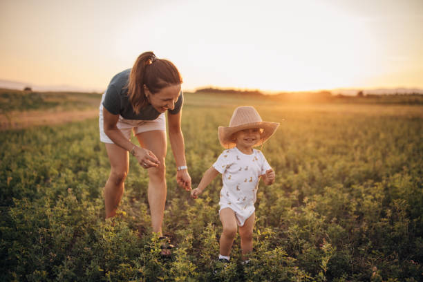 istock Mother and son on a meadow 1336068496
