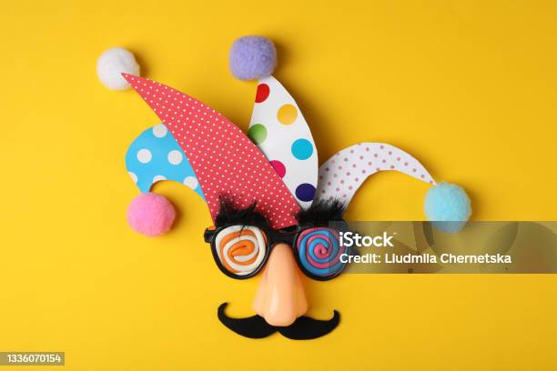 Funny Face Made Of Party Items On Yellow Background Flat Lay April Fools Day Stock Photo - Download Image Now