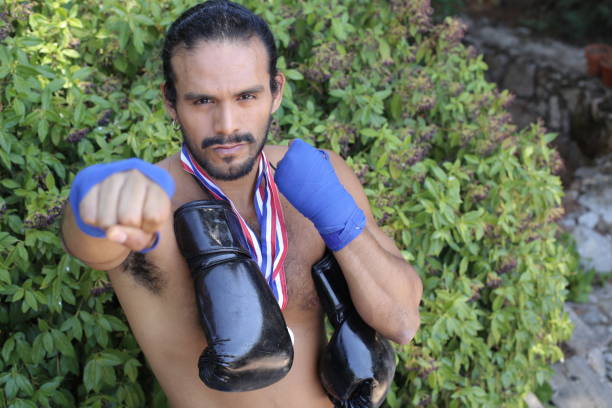 istock Muscular boxer winning a prize 1336071365
