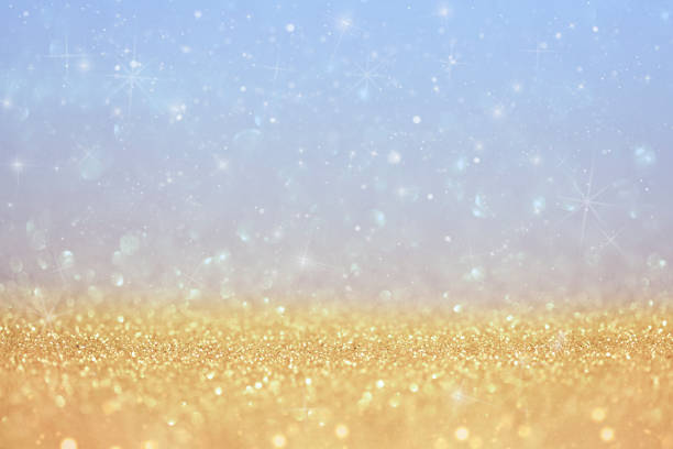 istock defocused christmas festive background blue and yellow 1336076733
