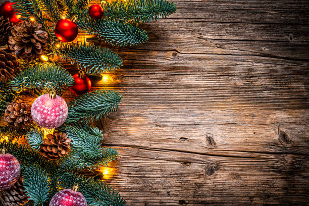 istock Christmas Holiday background on rustic wood table 1336076985