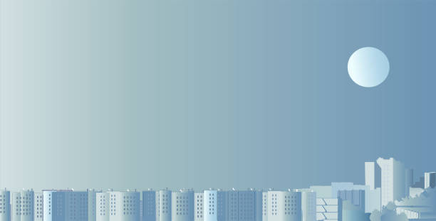 istock City, the moon against the background of the dawn sky 1336087523