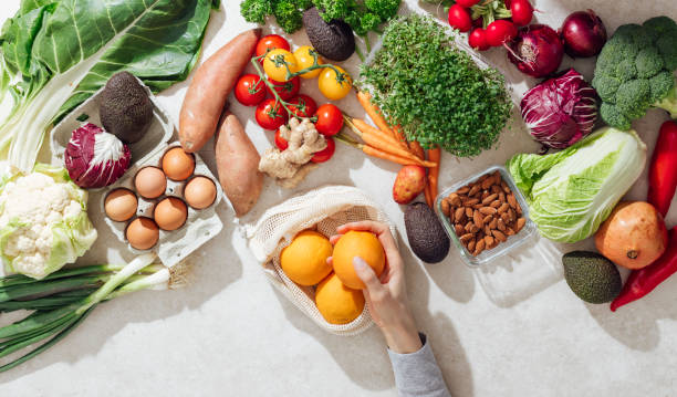 istock Unrecognizable Woman Making Healthy Meal at Home 1336087706