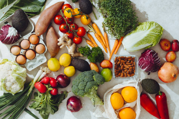 istock Colorful Vegetables and Fruits on Kitchen Desk 1336087714