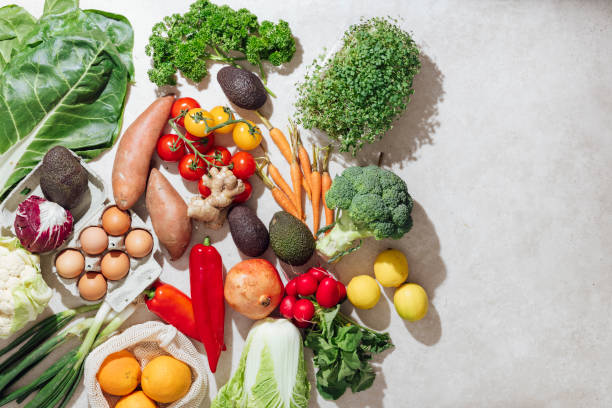 istock Colorful Vegetables and Fruits on Kitchen Desk 1336087722