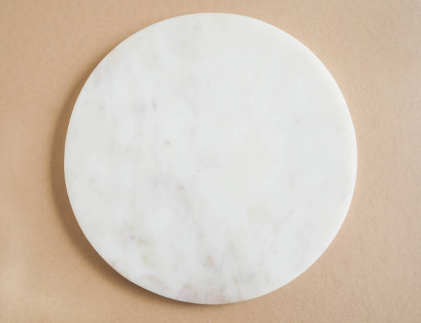 istock Marble white podium on beige background. 1336088418