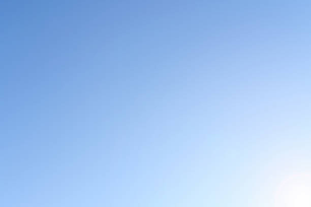 istock Blue sky with sunlight. The natural background is blue. 1336094734