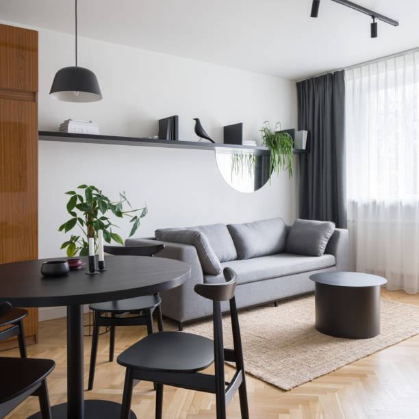 istock Simple living room with dining table 1336096626