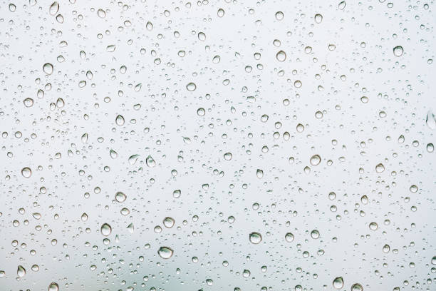 istock Water drops on glass, close up. background 1336096844