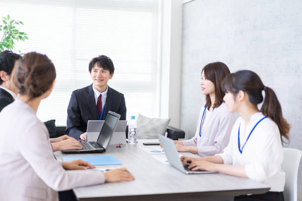istock Office workers having a business meeting 1336101282