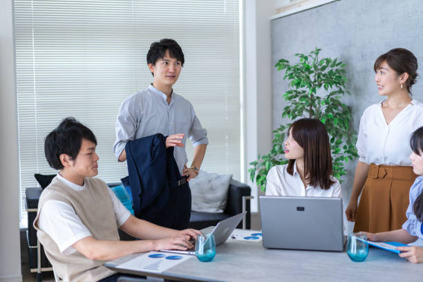 istock Office workers having a business meeting 1336101309