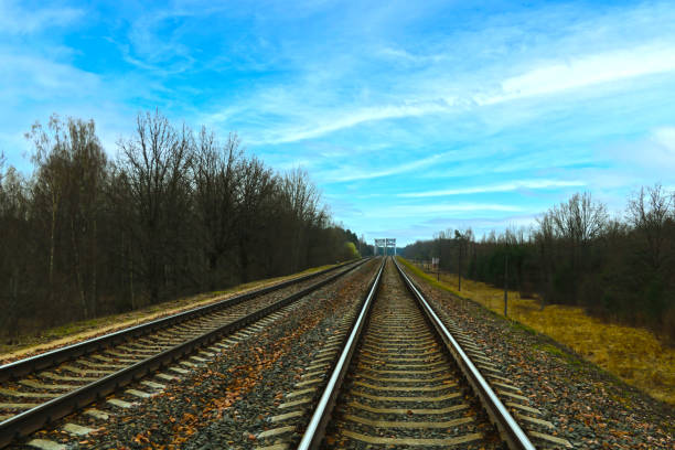 View of the railway against the blue sky